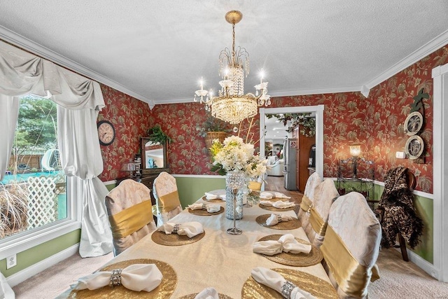 dining room featuring a notable chandelier, a textured ceiling, light carpet, and crown molding