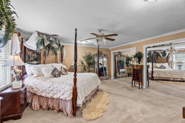 bedroom with light carpet, a textured ceiling, crown molding, and ceiling fan