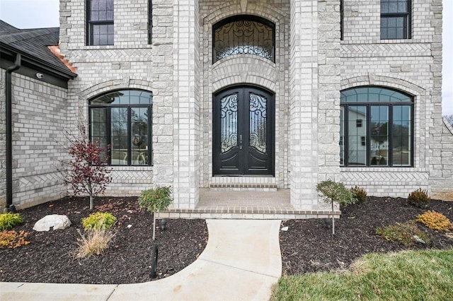 doorway to property featuring french doors