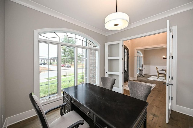 office featuring french doors, crown molding, and dark hardwood / wood-style flooring