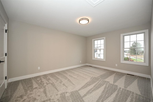 unfurnished room featuring carpet floors