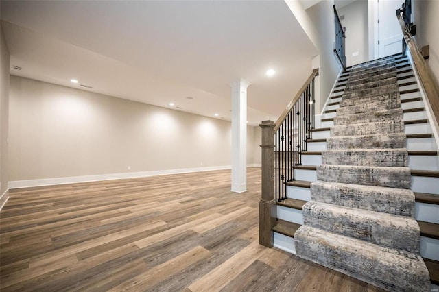 basement featuring wood-type flooring