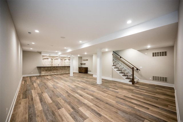 basement featuring hardwood / wood-style flooring