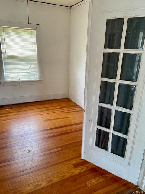 unfurnished room featuring light wood-type flooring