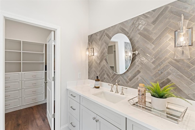 bathroom featuring vanity and wood-type flooring