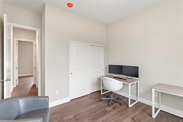 office area featuring dark hardwood / wood-style floors