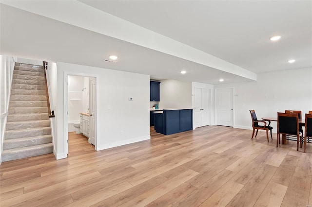 living room with light hardwood / wood-style floors