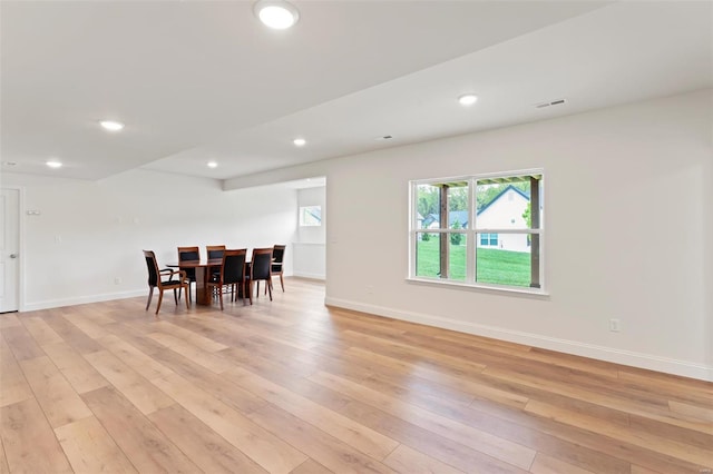 dining room with light hardwood / wood-style flooring