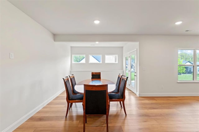 dining space featuring light hardwood / wood-style flooring