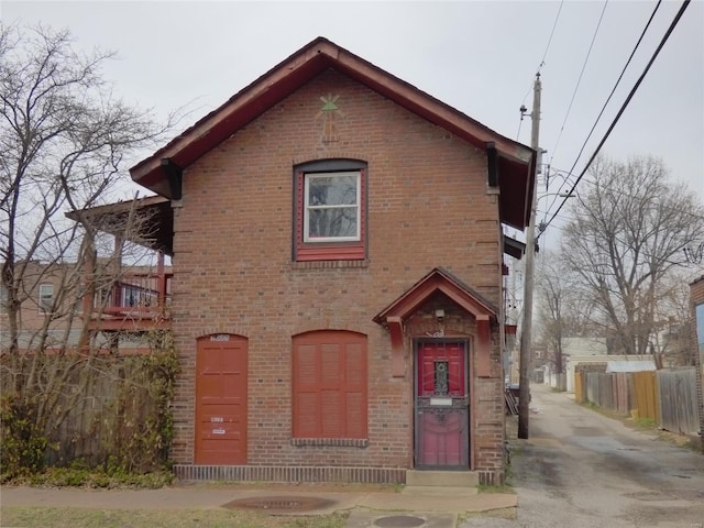 view of front of house with a balcony