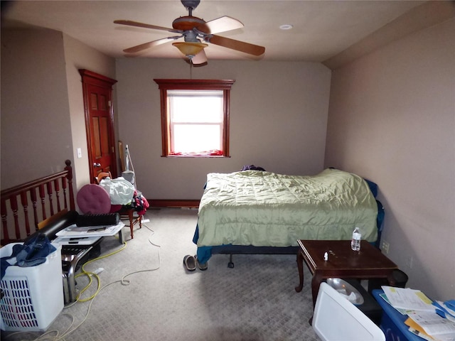 carpeted bedroom featuring ceiling fan