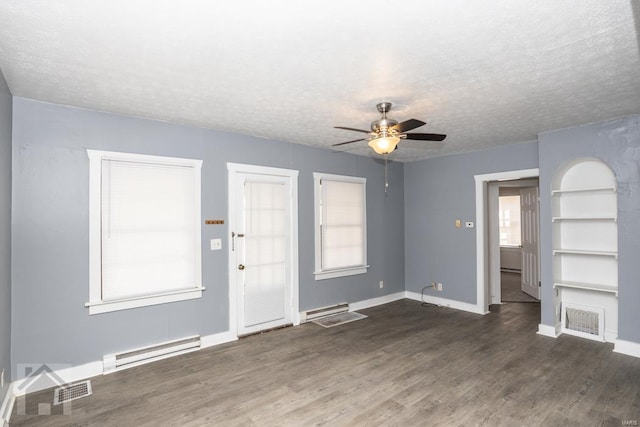 entrance foyer featuring a textured ceiling, ceiling fan, a baseboard radiator, and dark wood-type flooring