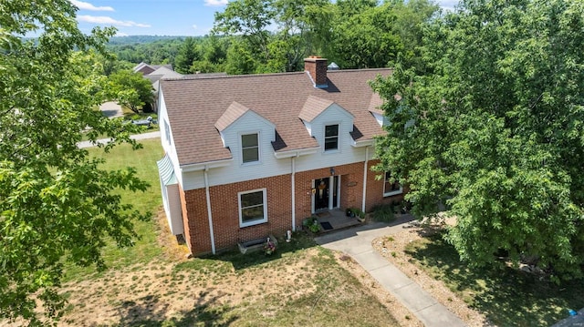 view of new england style home