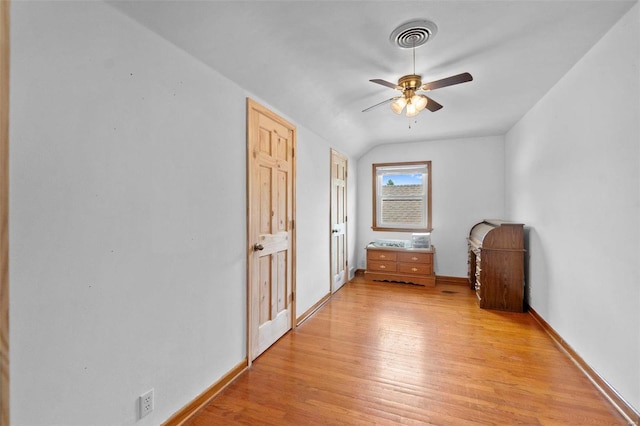 hall with light hardwood / wood-style floors