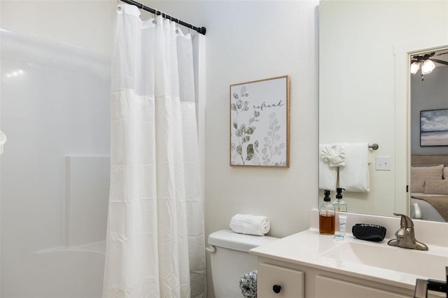 bathroom featuring curtained shower, ensuite bath, vanity, and toilet