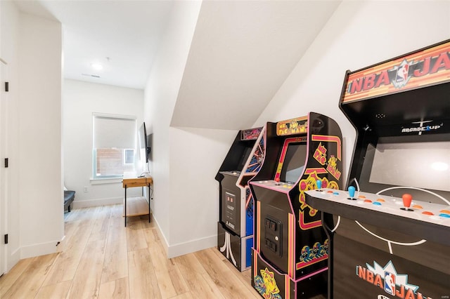 playroom featuring light wood-type flooring and baseboards