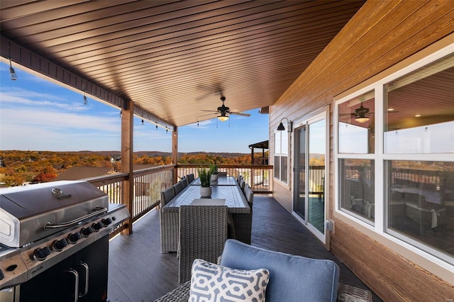 view of patio / terrace with outdoor dining area, ceiling fan, and area for grilling