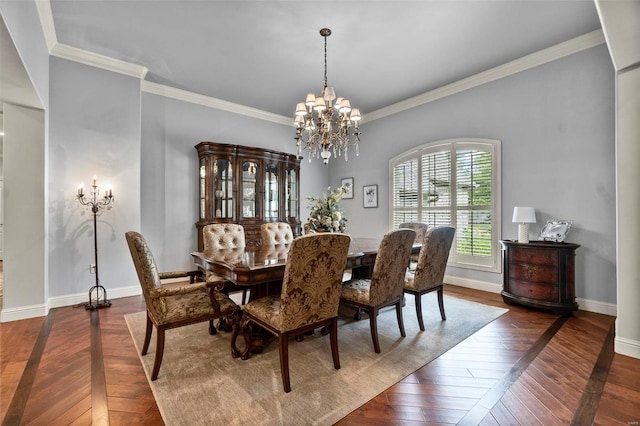 dining space featuring an inviting chandelier and ornamental molding