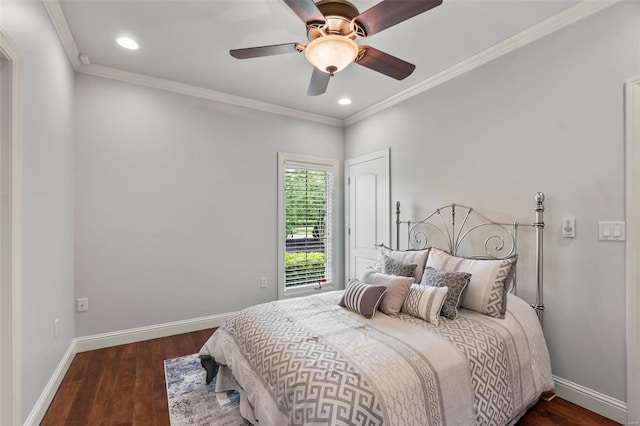 bedroom featuring ceiling fan, dark wood-type flooring, and ornamental molding