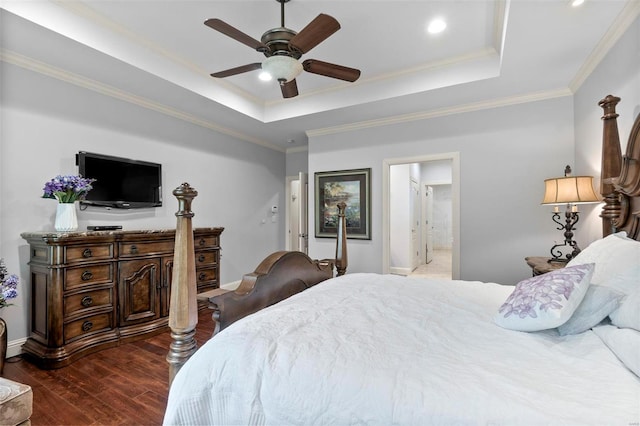 bedroom featuring crown molding, ceiling fan, a raised ceiling, and dark hardwood / wood-style floors