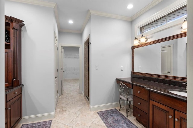 bathroom featuring tile floors, vanity, and crown molding