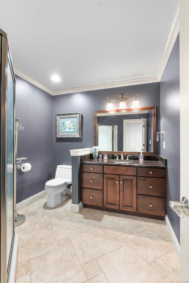 bathroom featuring toilet, tile floors, vanity, and crown molding