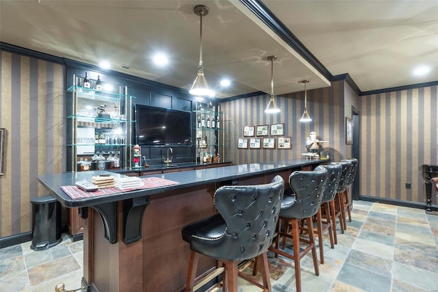 bar featuring crown molding, light tile flooring, pendant lighting, and sink