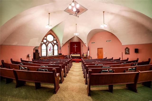 playroom with light colored carpet and vaulted ceiling