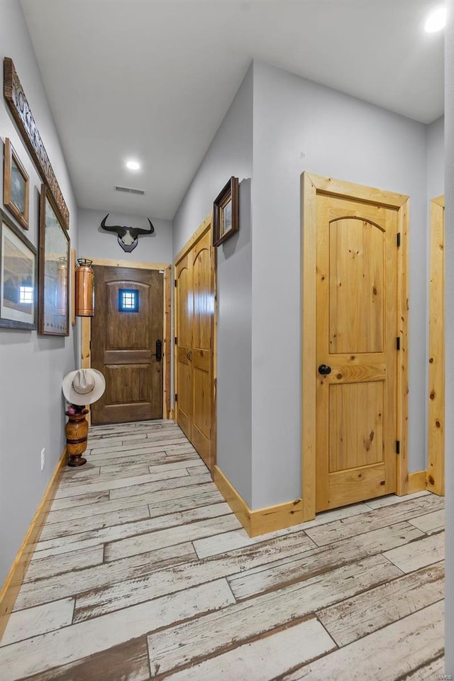 foyer entrance featuring light wood-type flooring