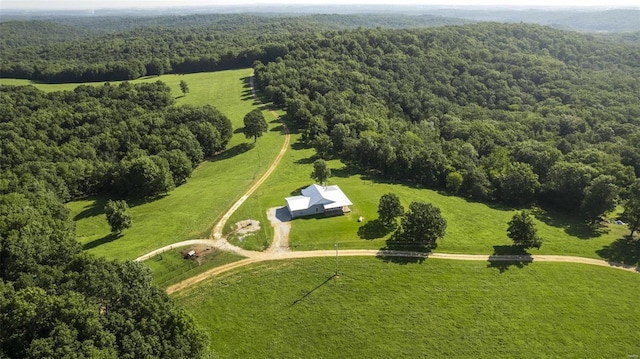 birds eye view of property with a rural view