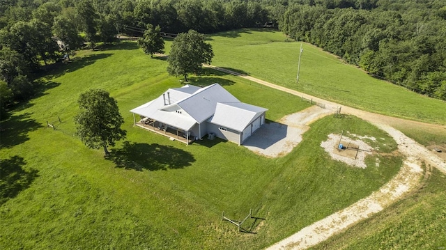 birds eye view of property featuring a rural view