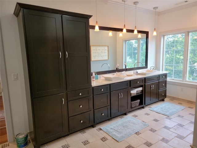 bathroom with tile flooring, ornamental molding, and double vanity