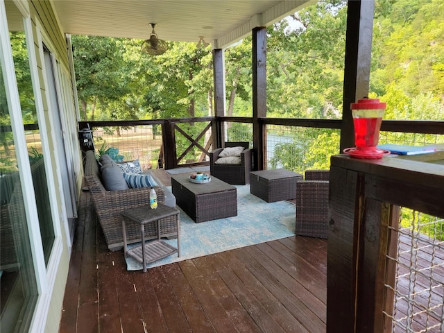 deck with an outdoor hangout area