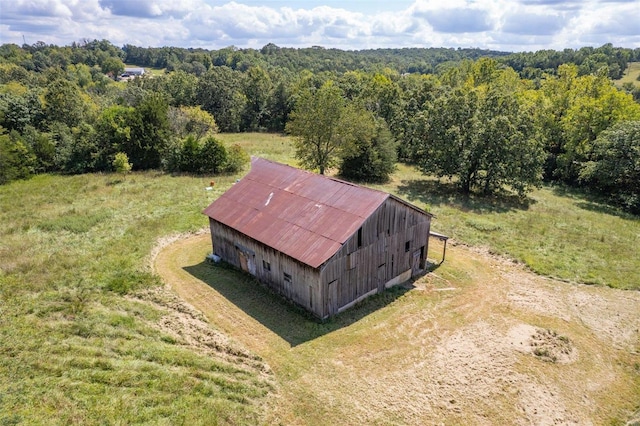 birds eye view of property featuring a rural view