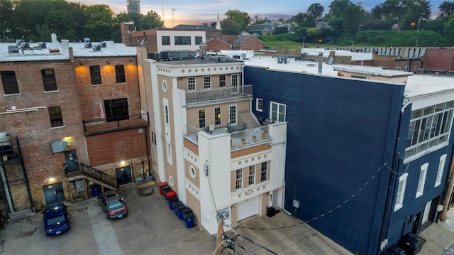 view of outdoor building at dusk