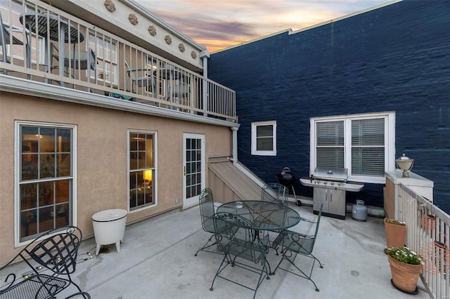 patio terrace at dusk with grilling area