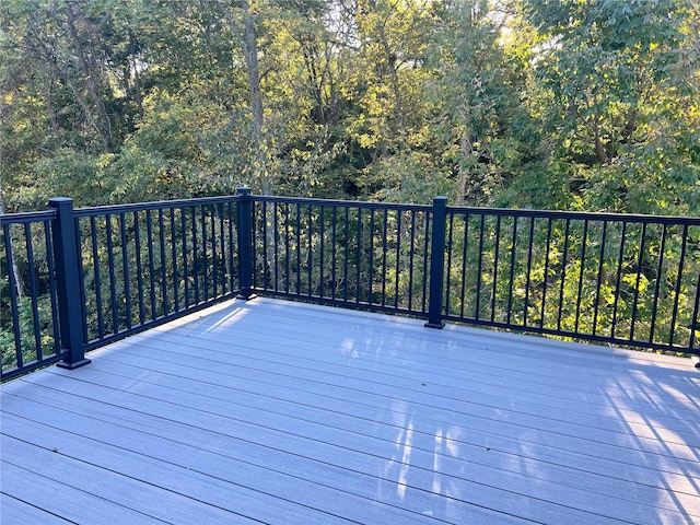 deck with a wooded view