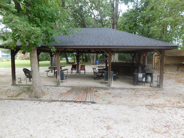 view of property's community featuring a gazebo and a patio area