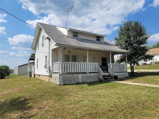 view of front of house featuring a front lawn and a porch