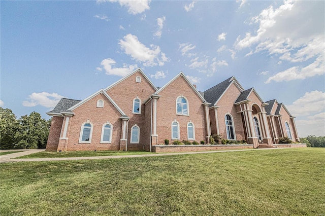 front facade with a front lawn