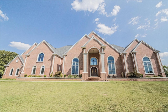 front facade with a front lawn