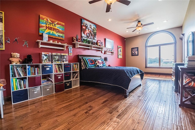 bedroom featuring ceiling fan and hardwood / wood-style flooring