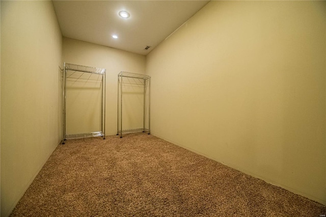 spare room with light colored carpet