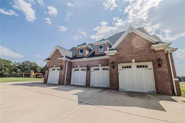 view of front of property featuring a garage