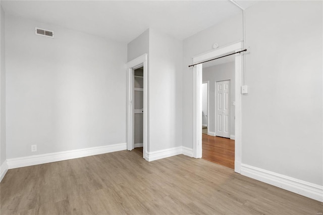 unfurnished bedroom featuring light hardwood / wood-style flooring