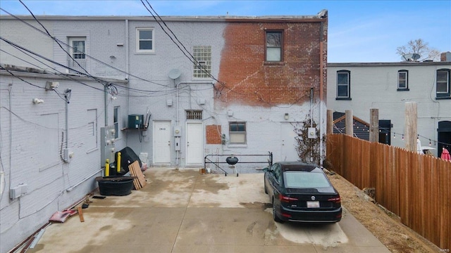 rear view of property with central air condition unit