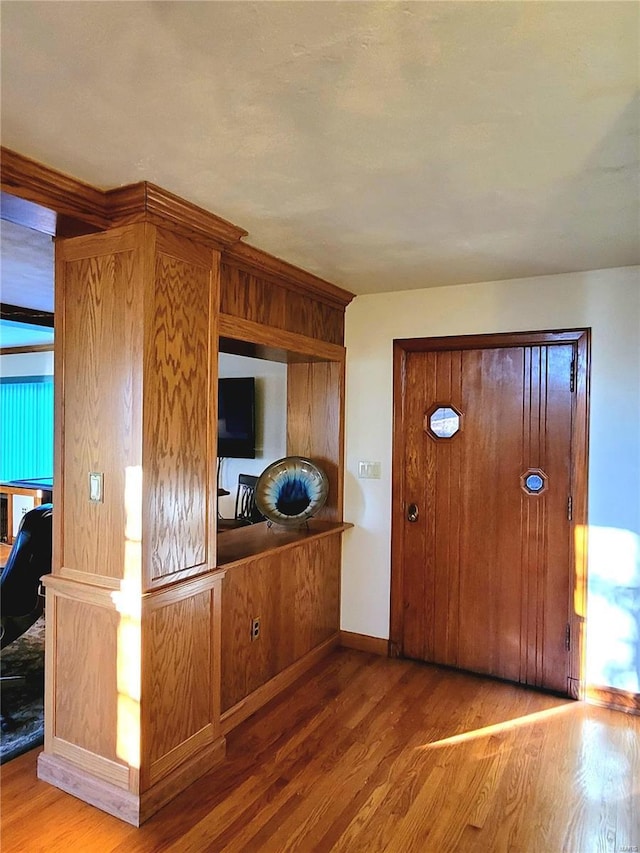 entryway featuring hardwood / wood-style flooring