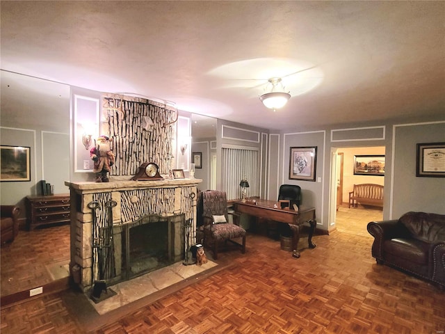 living room featuring parquet floors and a textured ceiling