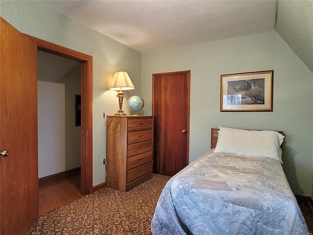 bedroom with vaulted ceiling