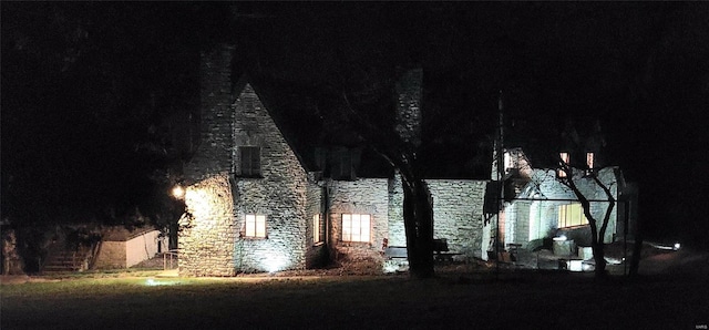 view of property exterior at twilight